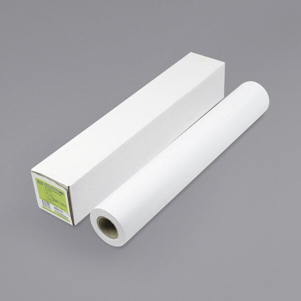 A roll of HP Inc. white universal bond paper on a white and grey surface next to a white box.