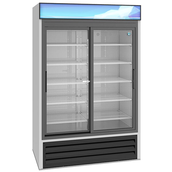 A Hoshizaki glass door refrigerator with shelves.