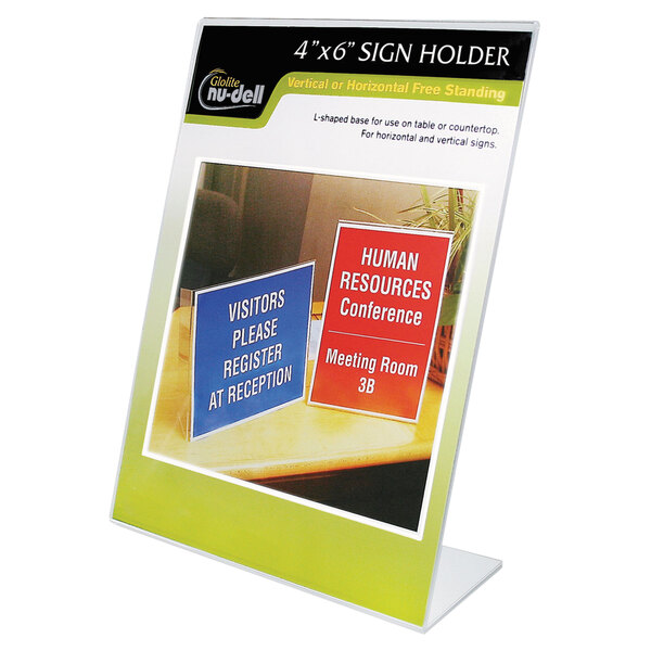 A NuDell clear plastic desktop sign holder with two signs in it.