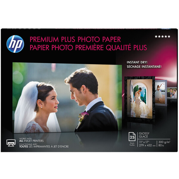 A box of HP Premium Plus glossy white photo paper with a white background.