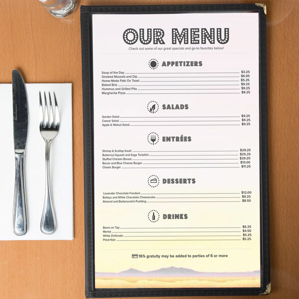 A Southwest themed menu with a cactus design on a table.