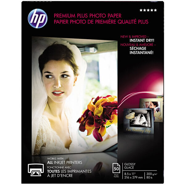 HP Inc. CR664A Premium Plus glossy white photo paper with a bouquet of flowers on it.