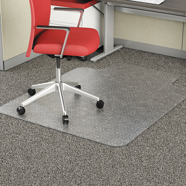A red office chair with wheels on a clear studded chair mat.