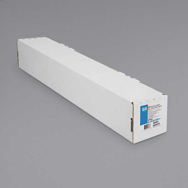 A long white box with blue label that reads "HP Inc. Q7993A 100' x 36" Glossy White Roll of 10.3 Mil Premium Instant-Dry Photo Paper"