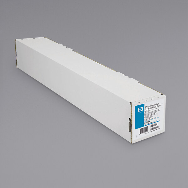 A white box with blue and black text reading "HP Inc. Q7996A 100' x 42" Satin White Roll of Premium Instant-Dry Photo Paper"