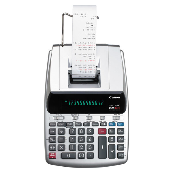 A Canon MP11DX2 calculator printing a receipt in black and red.