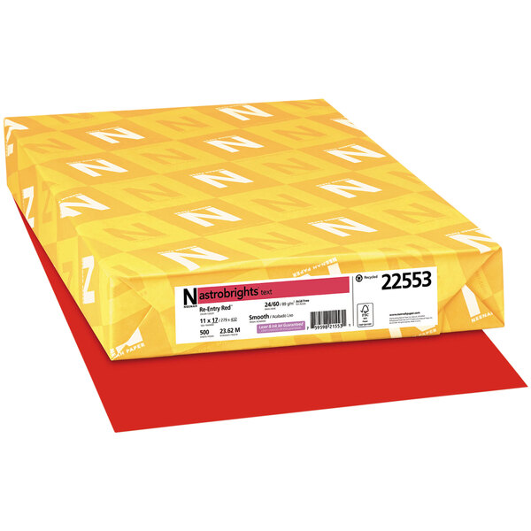 A yellow package of Astrobrights Re-Entry Red paper with white letters.