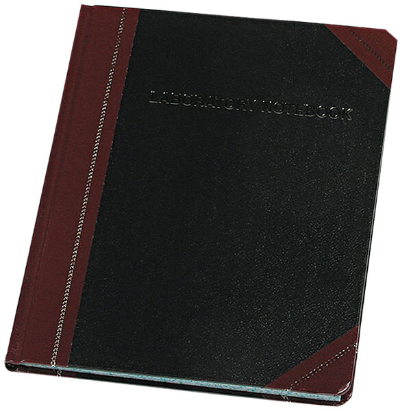 A white Boorum & Pease laboratory notebook with a red and black label.