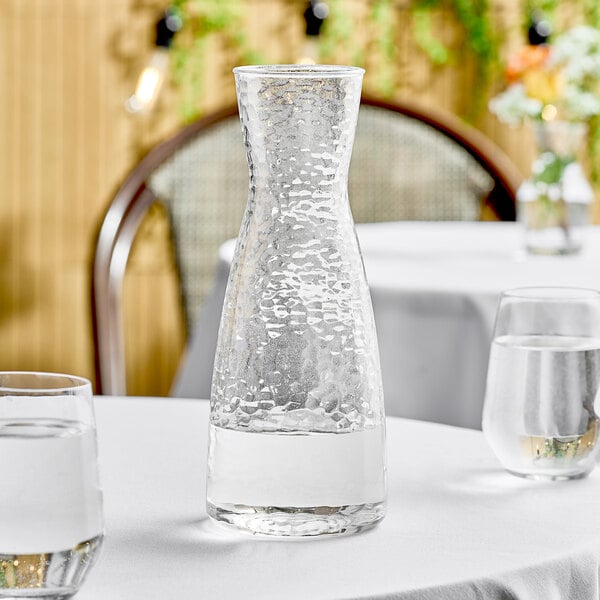 Front of the House ACF003CLT22 Drinkwise 38 oz. Hammered Design Plastic Carafe
