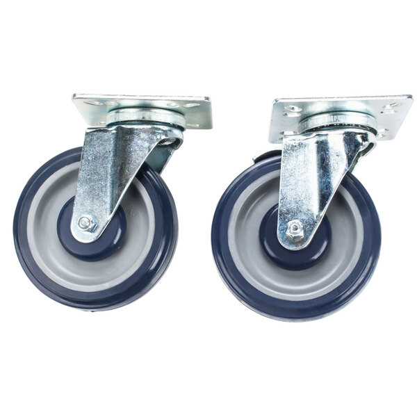 A pair of Regency heavy duty zinc swivel plate casters with rubber wheels.