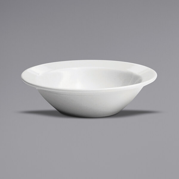 A white Oneida Buffalo porcelain grapefruit bowl.
