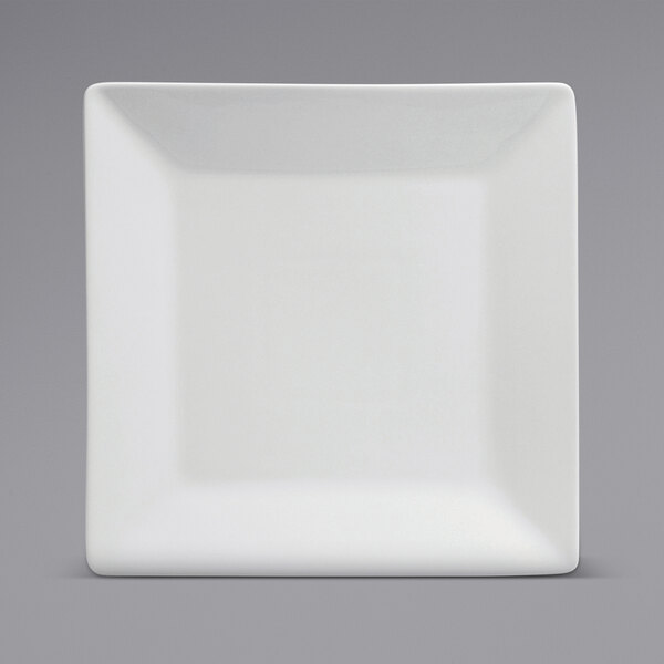 A close-up of a white Oneida Buffalo porcelain square plate with a rolled edge.