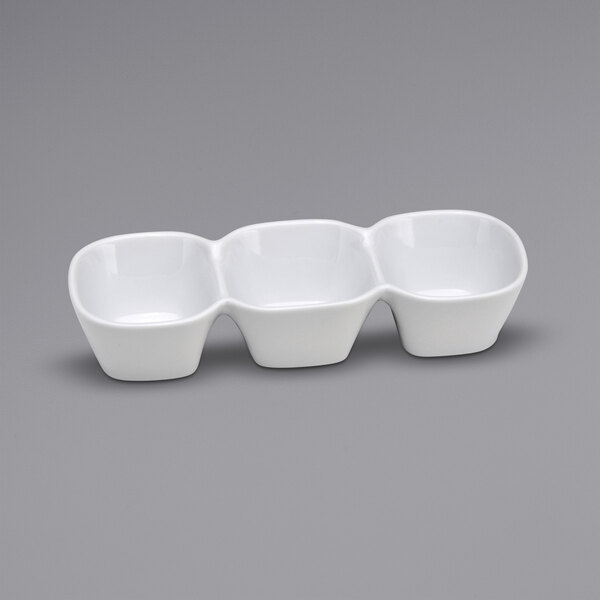 Three Oneida Buffalo Bright White Ware 3-compartment porcelain bowls stacked on top of each other.