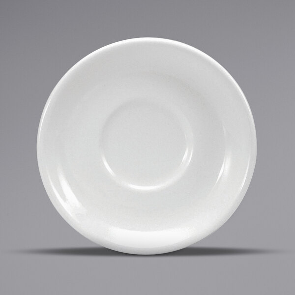 A close-up of a Oneida Buffalo Bright White Ware porcelain saucer with a rolled edge.