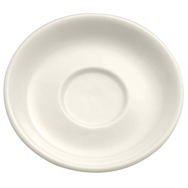 A white porcelain saucer with a small rim and a circle in the middle.