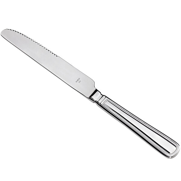 A Libbey stainless steel dinner knife with a handle and pinched bolster.