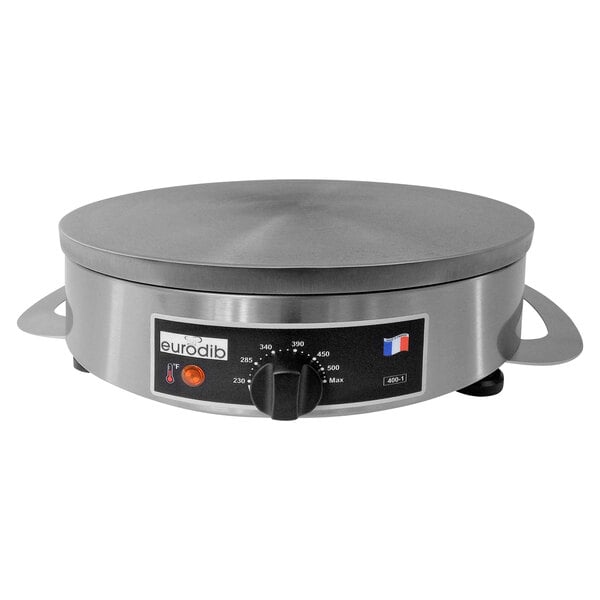 A stainless steel Eurodib crepe maker with a round metal surface and a red knob.