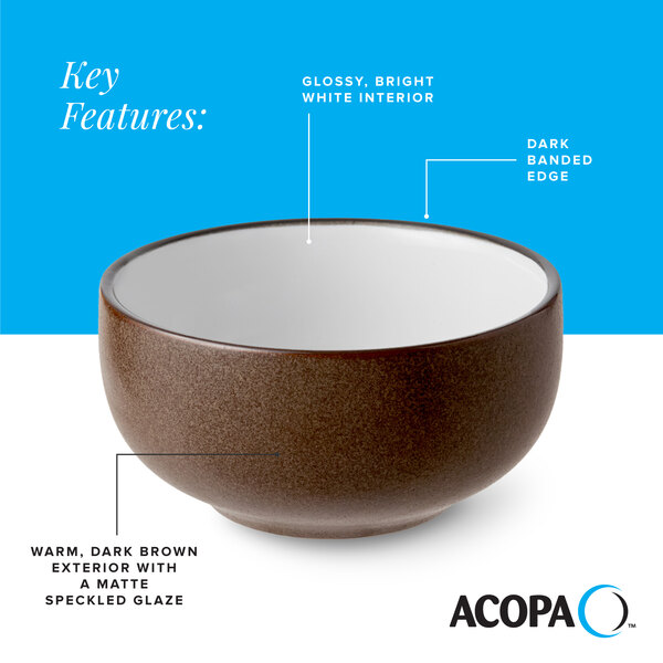 A stoneware bowl with a warm, dark brown matte speckled exterior, a glossy white interior, and a dark banded edge.