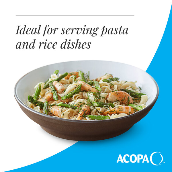 A large brown matte stoneware pasta bowl filled with pasta and vegetables.