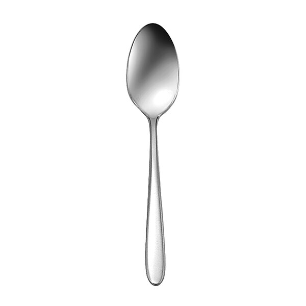 A close-up of a Oneida Mascagni stainless steel European teaspoon with a silver handle.