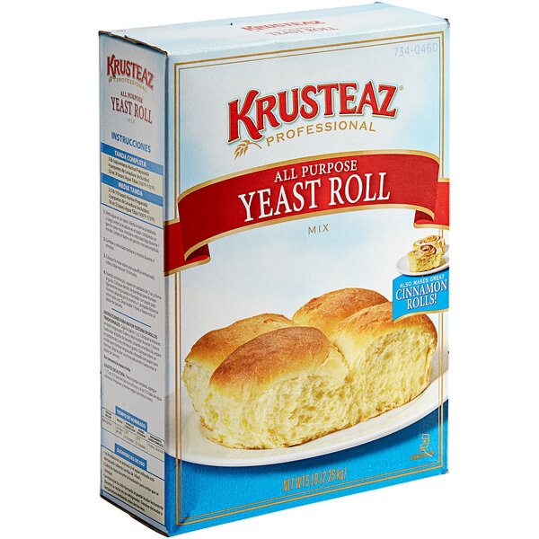 A white and blue box of Krusteaz Professional All-Purpose Yeast Roll Mix.