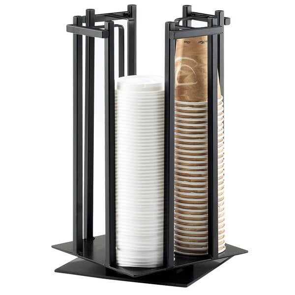 A black metal Cal-Mil revolving cup and lid organizer with cups in it.