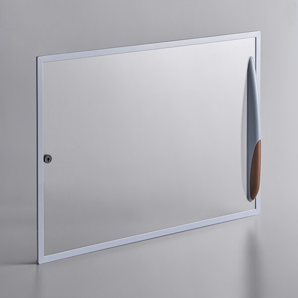 A white rectangular glass lid with a handle.