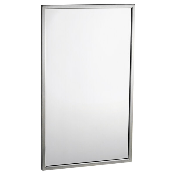 A Bobrick rectangular mirror with a silver frame.
