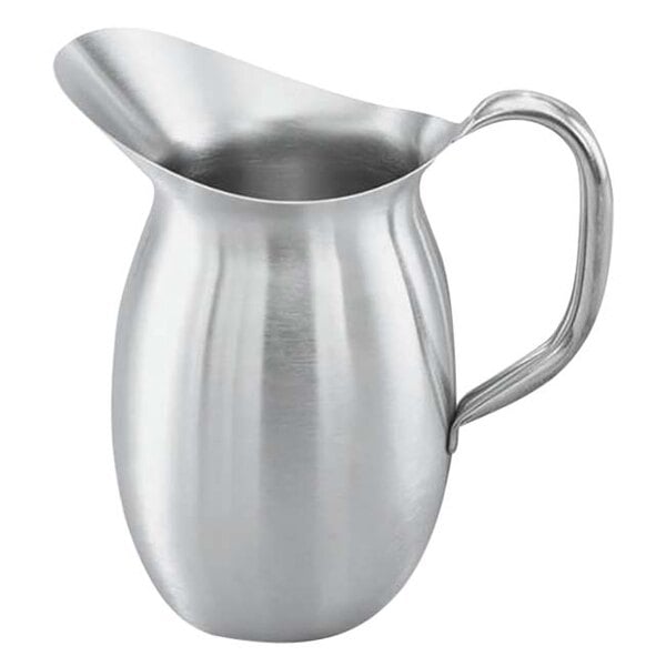 A silver stainless steel Vollrath bell pitcher with a handle.