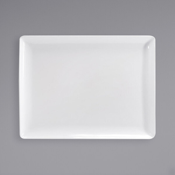 A white rectangular porcelain platter with a black border.