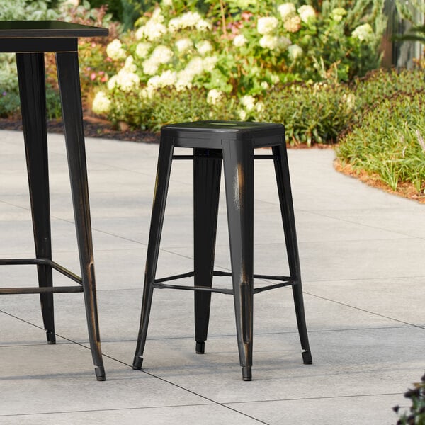 Lancaster Table & Seating Alloy Series Distressed Copper Outdoor Backless Barstool