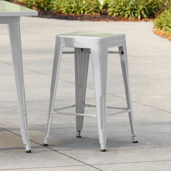 Lancaster Table & Seating Alloy Series Silver Outdoor Backless Counter Height Stool