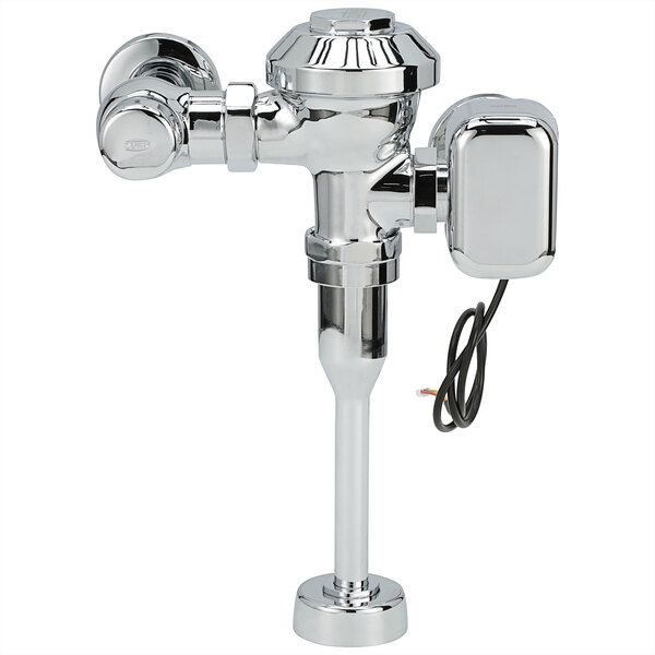 A Zurn chrome metal urinal flush valve with hardwired automatic sensor.
