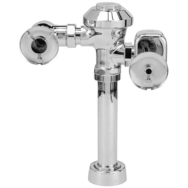 A silver metal Zurn toilet flush valve with hardwired automatic sensor.