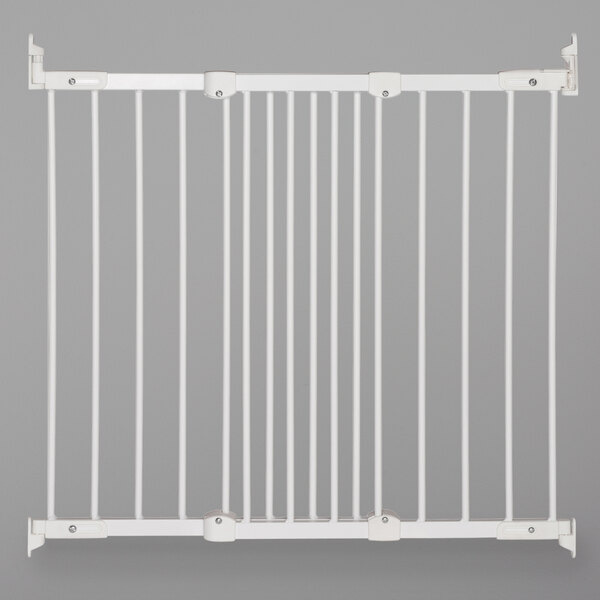 A white L.A. Baby metal angle mount safety gate with bars.