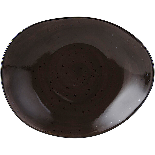 A black plate with speckled specks.