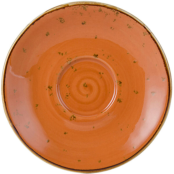 An orange Tuxton TuxTrendz saucer with a swirl pattern in the middle.