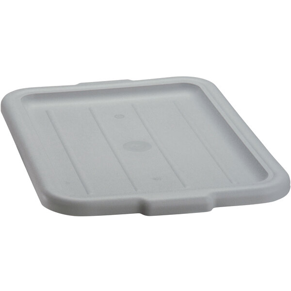 A gray high density polyethylene bus tub lid on a white plastic tray.