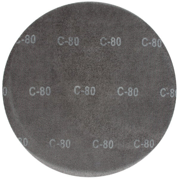A circular Bissell Commercial sand screen disc with white text reading "100 Grit"