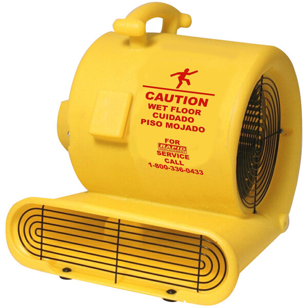 A yellow Bissell Commercial air mover with black lines and a caution sign on it.
