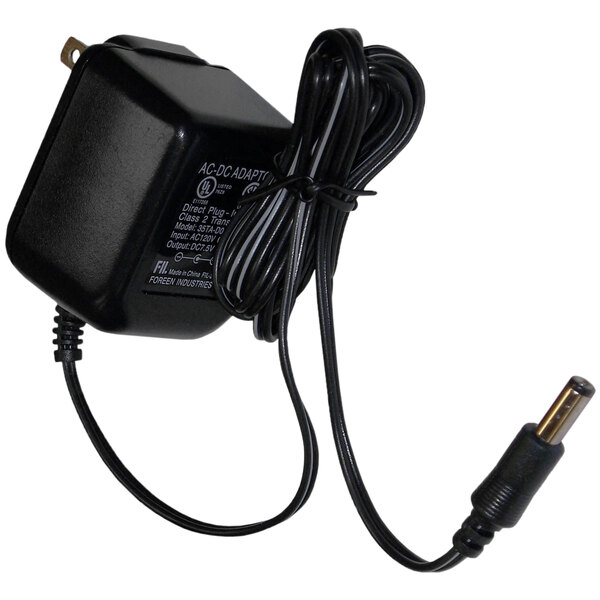 A close-up of a black Bissell BG9100NM battery charger with a cord attached.