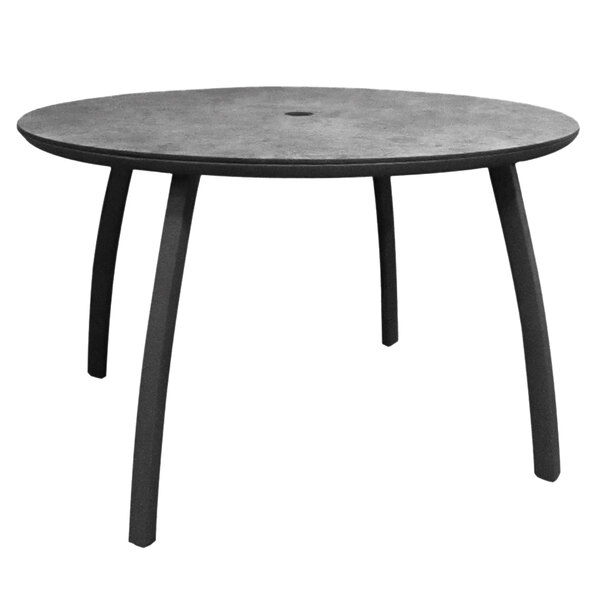 A Grosfillex Sunset round table with a black top and legs.
