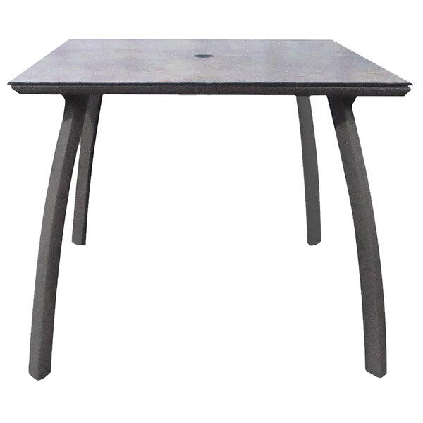 A Grosfillex square table with metal legs and a grey top.