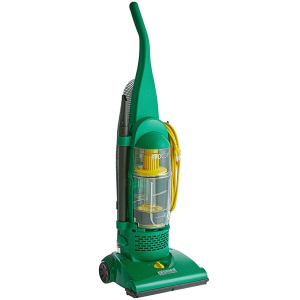 A green and yellow Bissell Commercial ProCup bagless upright vacuum cleaner.