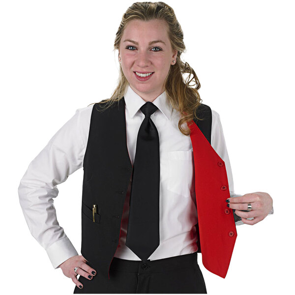 A woman in a Henry Segal black and red reversible server vest and tie.