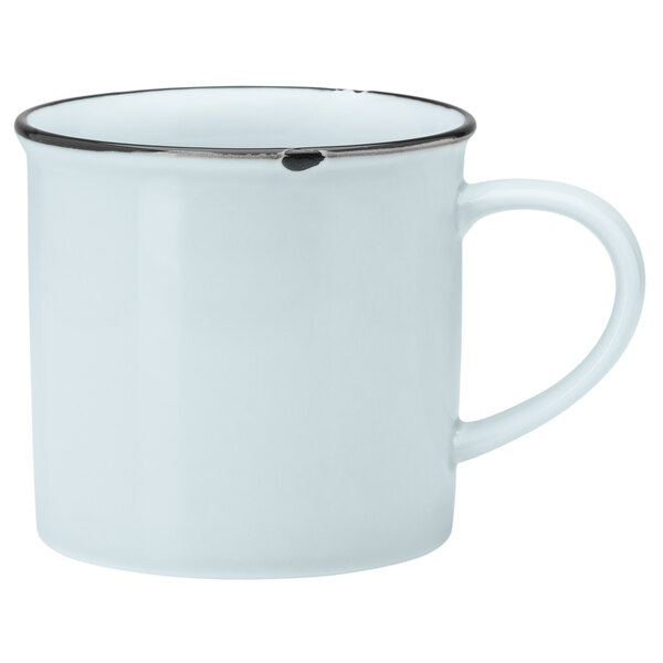 A white porcelain mug with a silver rim.