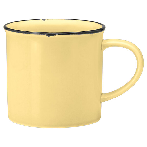 A Luzerne yellow porcelain mug with a black rim.
