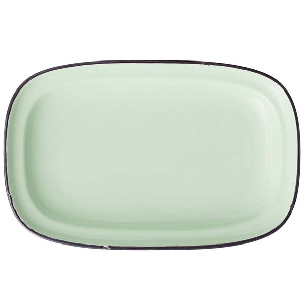 A green rectangular porcelain platter with black trim.