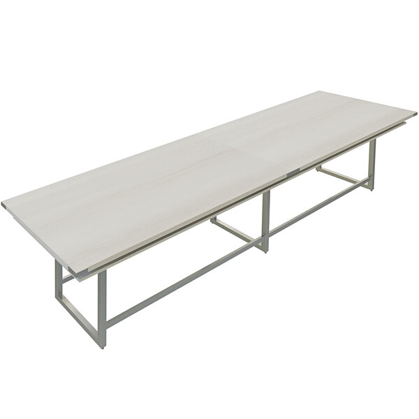 A Safco Mirella white rectangular standing conference table with metal legs.