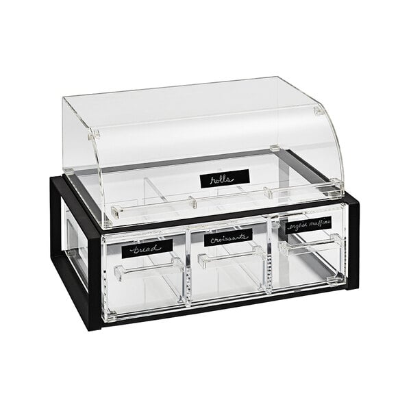 A clear acrylic pastry display case with full drawer in a black frame.